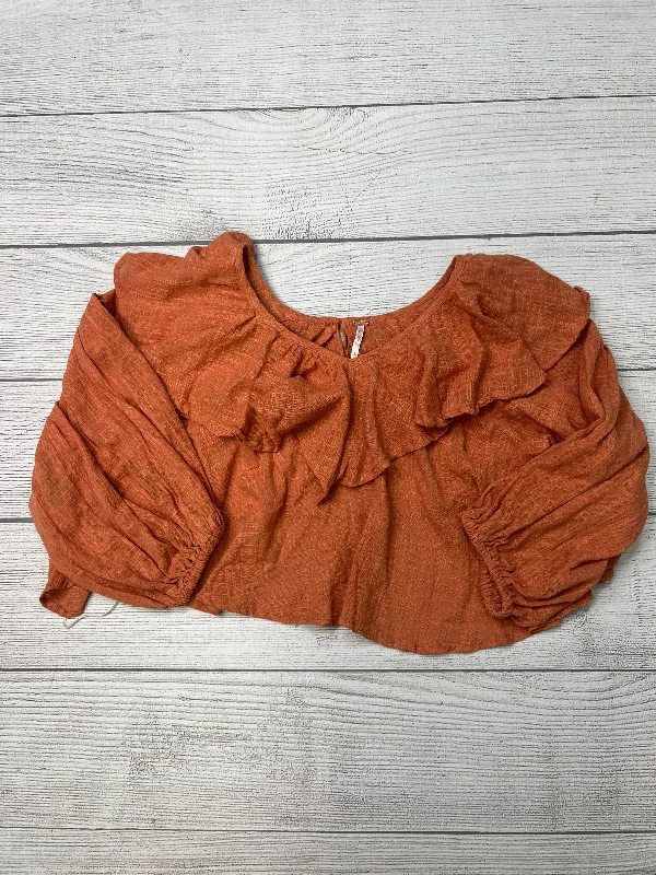 women's tops for those who want to create stylish and put-together outfits without spending a fortuneTop Long Sleeve By Free People In Orange, Size: S